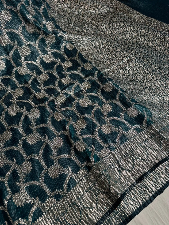 Midnight Green Pashmina silk saree with vertical crush pattern and rich pallu