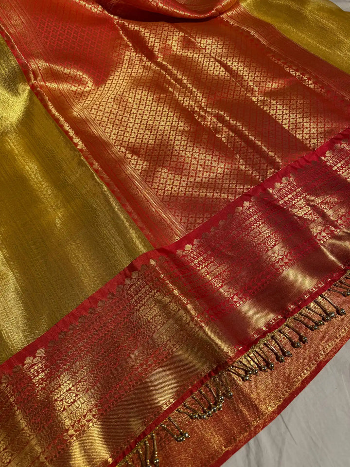 Golden Nita Ambani Mam inspired tissue silk saree with heavy jarkan lace work