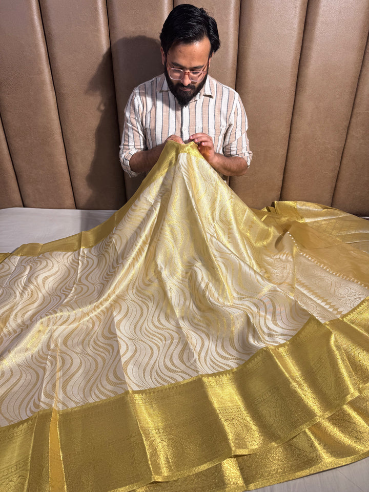 Golden Kanjeevaram Tissue Silk Daree with rich pallu