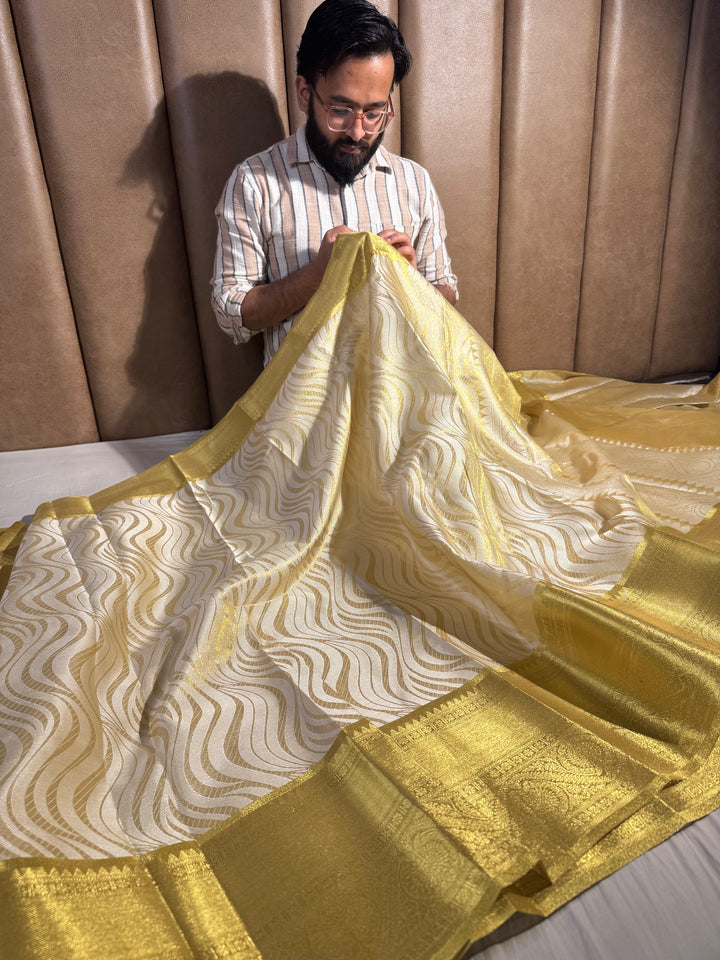 Golden Kanjeevaram Tissue Silk Daree with rich pallu
