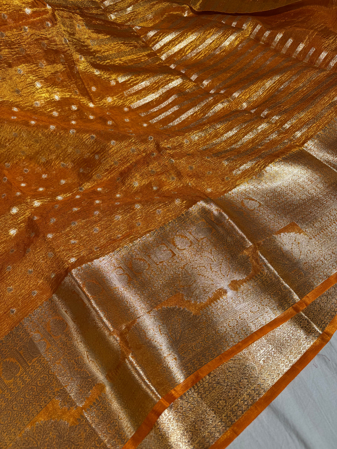 Orange Tissue banarasi saree with rich pallu and blouse