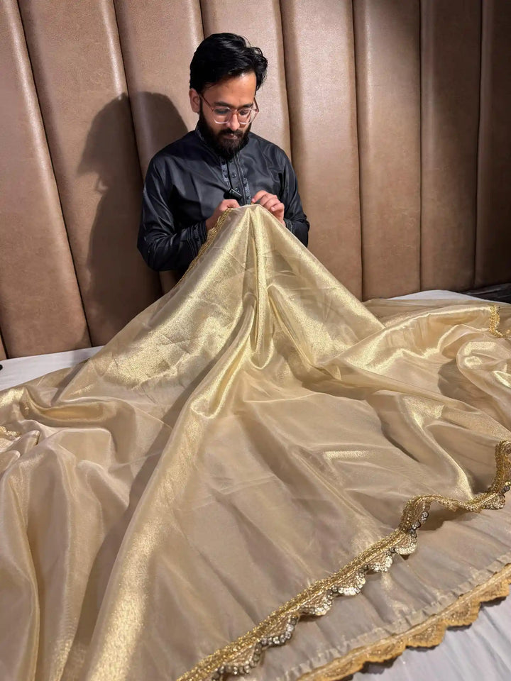 Ivory Gold Shade Tissue Silk Saree with Lacework