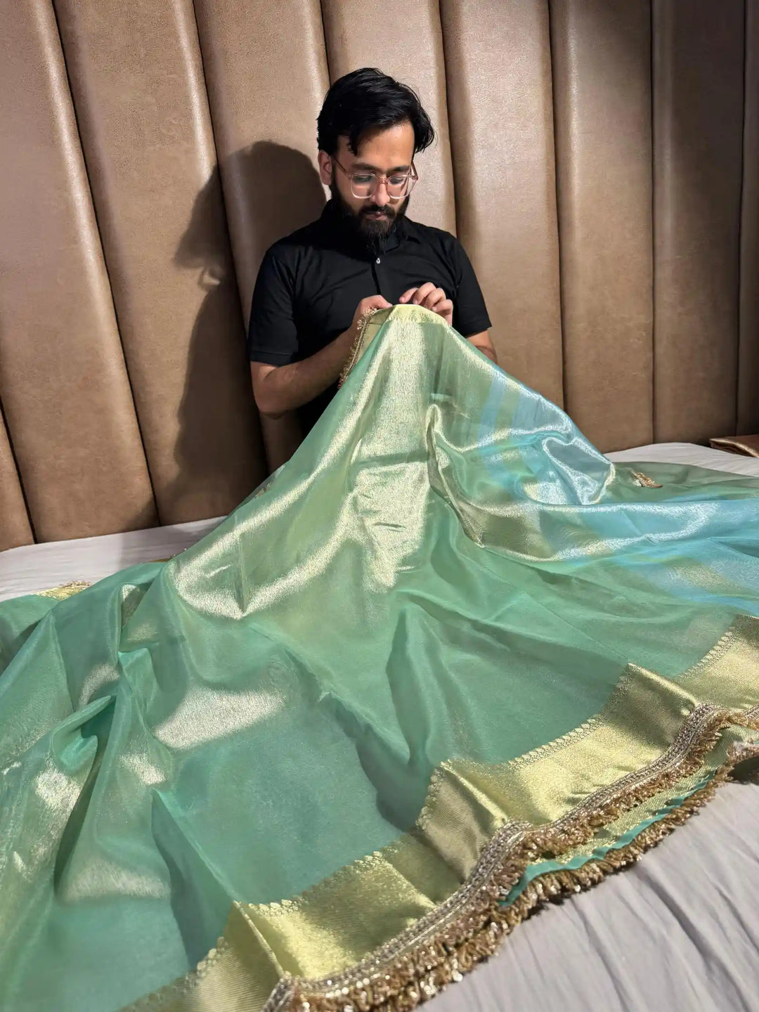 Light seasgreen tissue silk saree with lace work