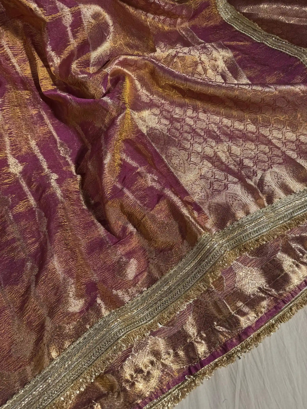 Luxurious Magenta banarasi crush tissue silk saree with designer lace work
