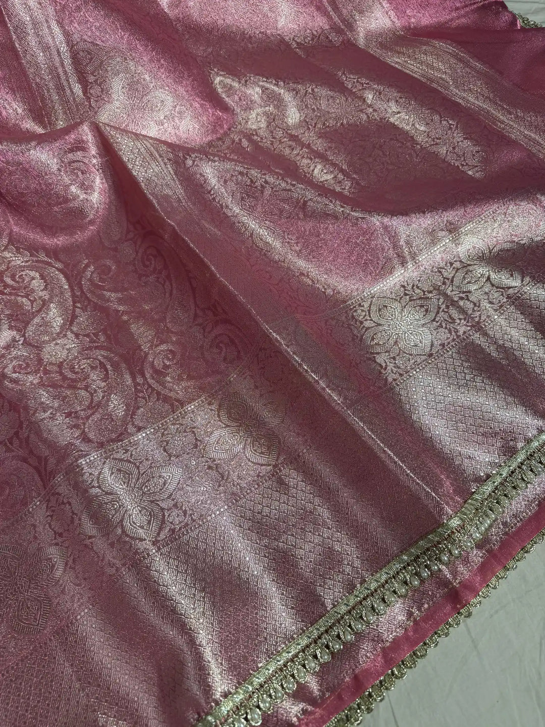 Metallic Pink Nita Ambani Mam inspired tissue silk saree with heavy jarkan lace work