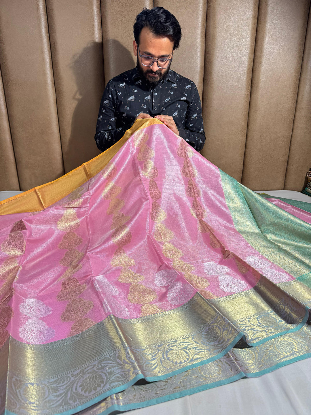 Pinkish tissue silk saree with rich pallu and blouse