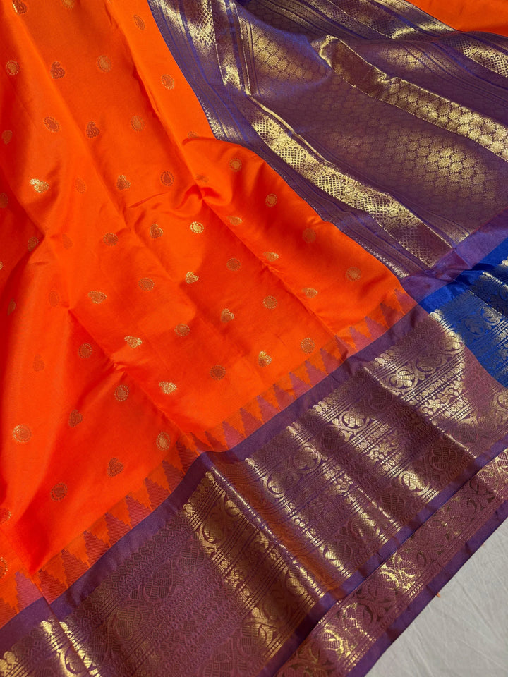 Premium orange dharmavarm pattu silk saree with contrast rich pallu and blouse