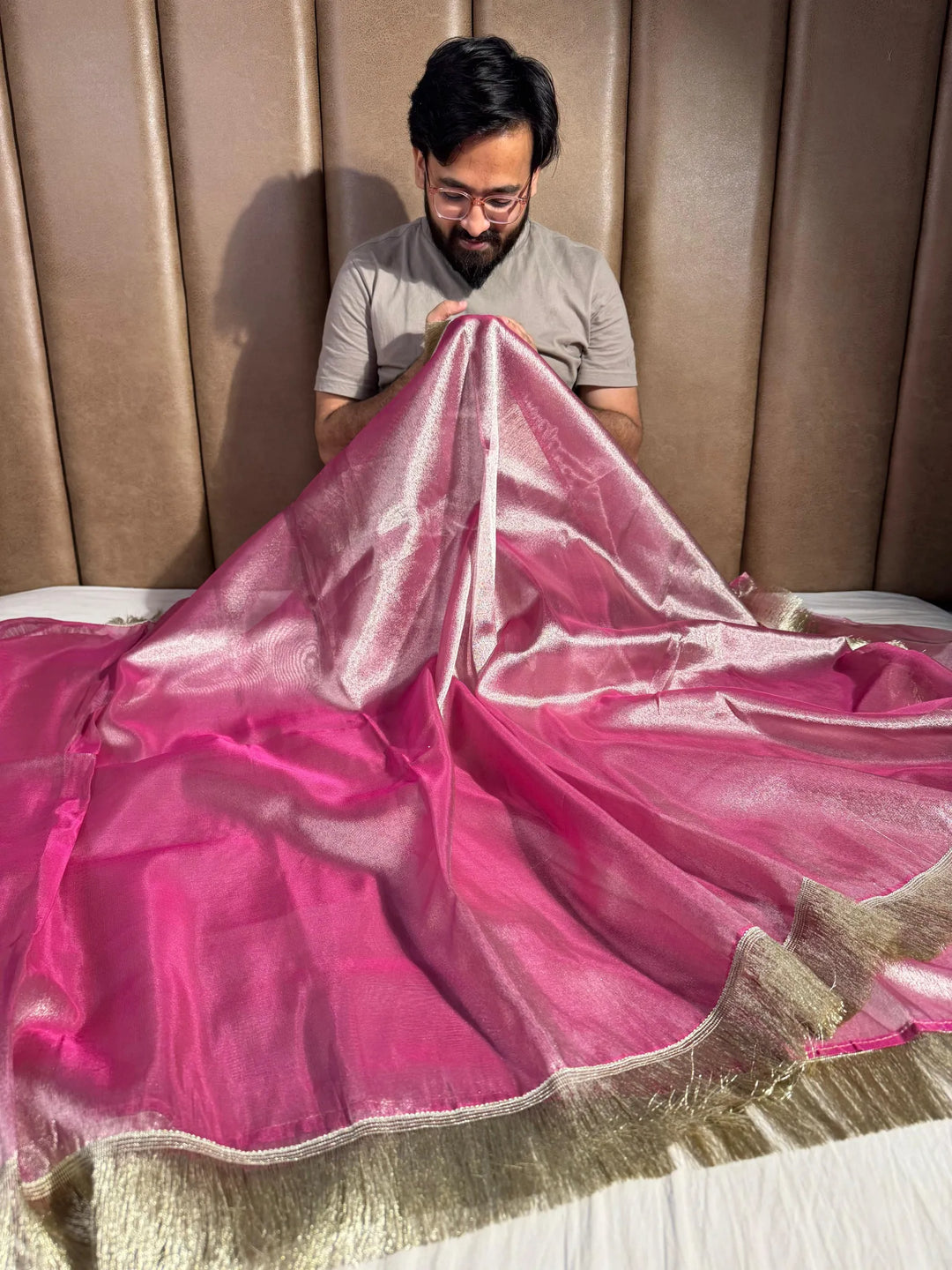 Premium rani pink tissue silk saree with lacework