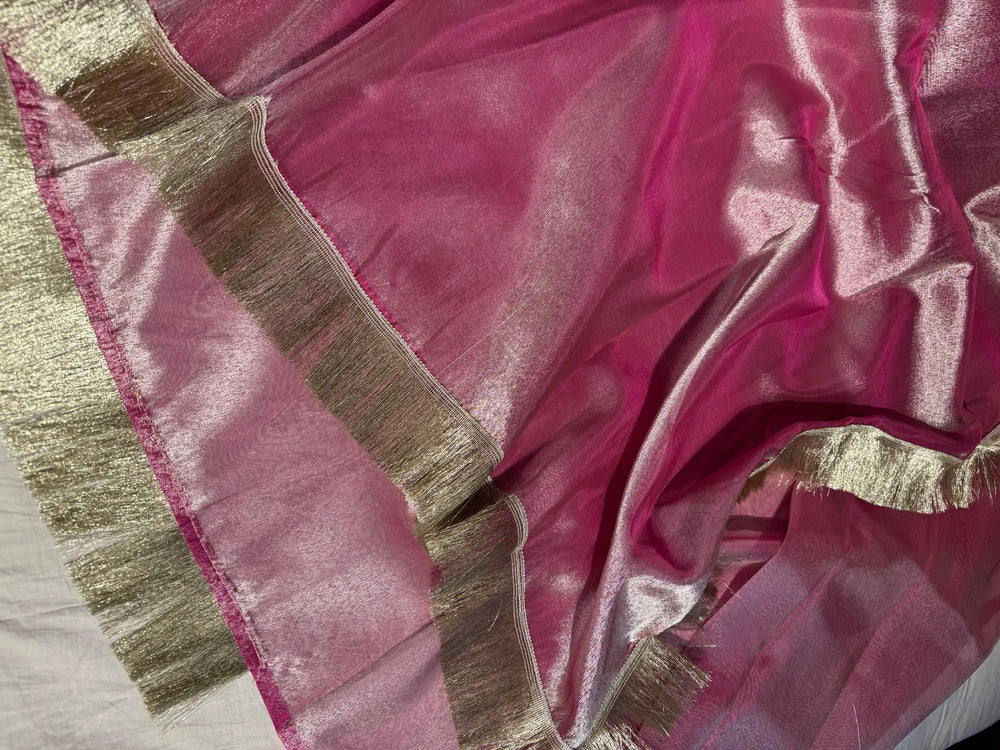 Premium rani pink tissue silk saree with lacework