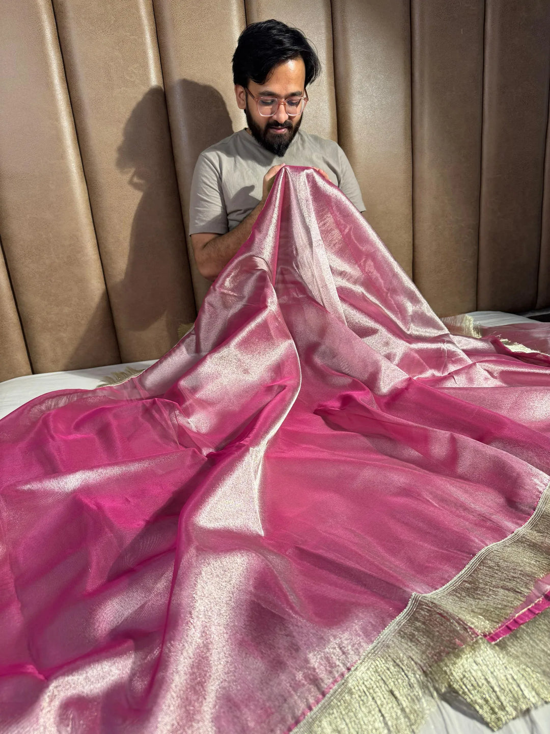 Premium rani pink tissue silk saree with lacework