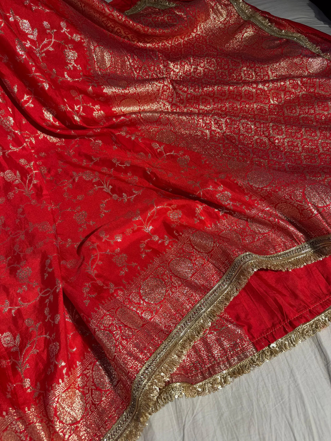 Red Banarasi georgette silk saree with silver meena work & lace work
