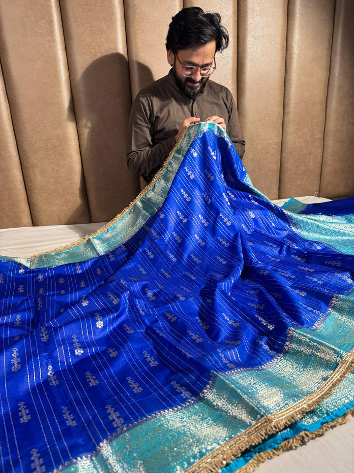 Royal blue banarasi warm silk saree with rich lacework and pallu