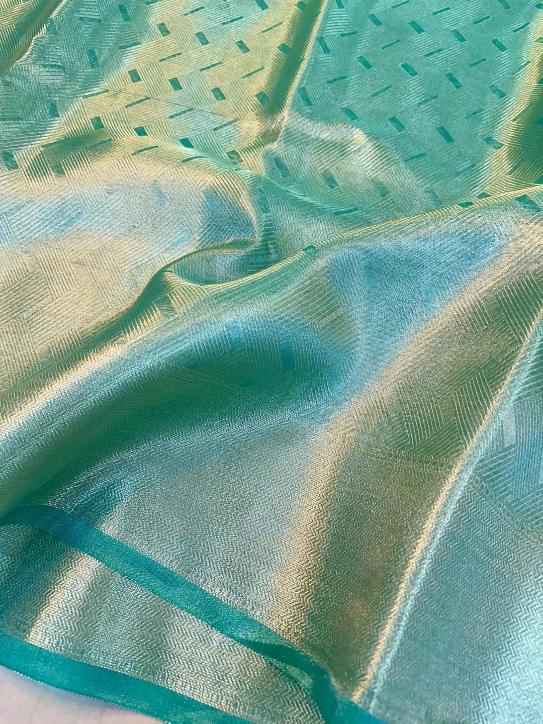 Sea Green Kanjivaram Tissue Silk Zari Embossed Saree