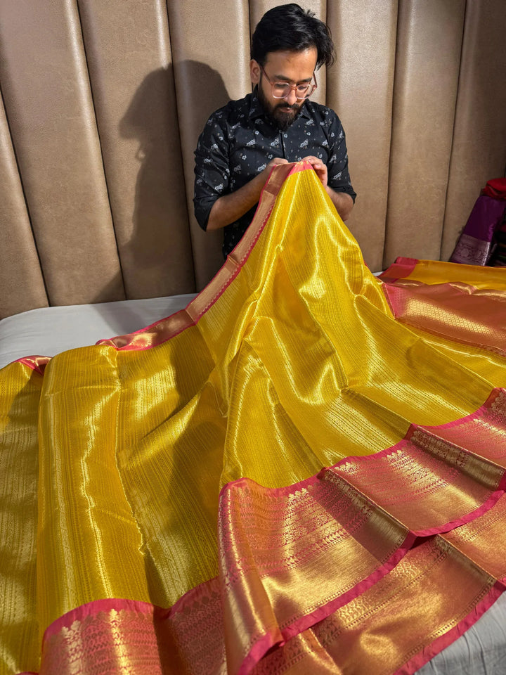 Premium kanjivaram tissue silk saree with rich pallu and blouse