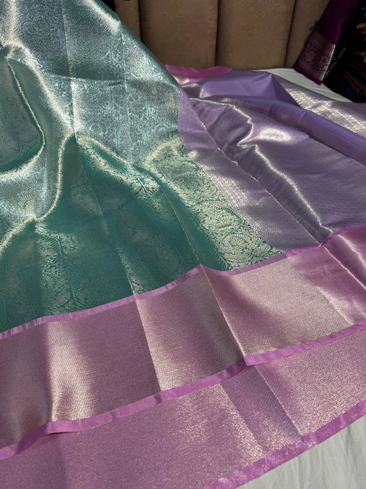 Premium Powder Blue Shade tissue silk saree with rich pallu and blouse