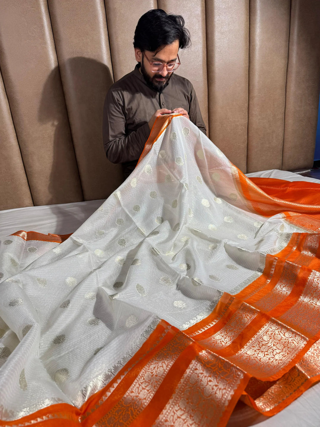 summer friendly cream with contrast rich border and pallu