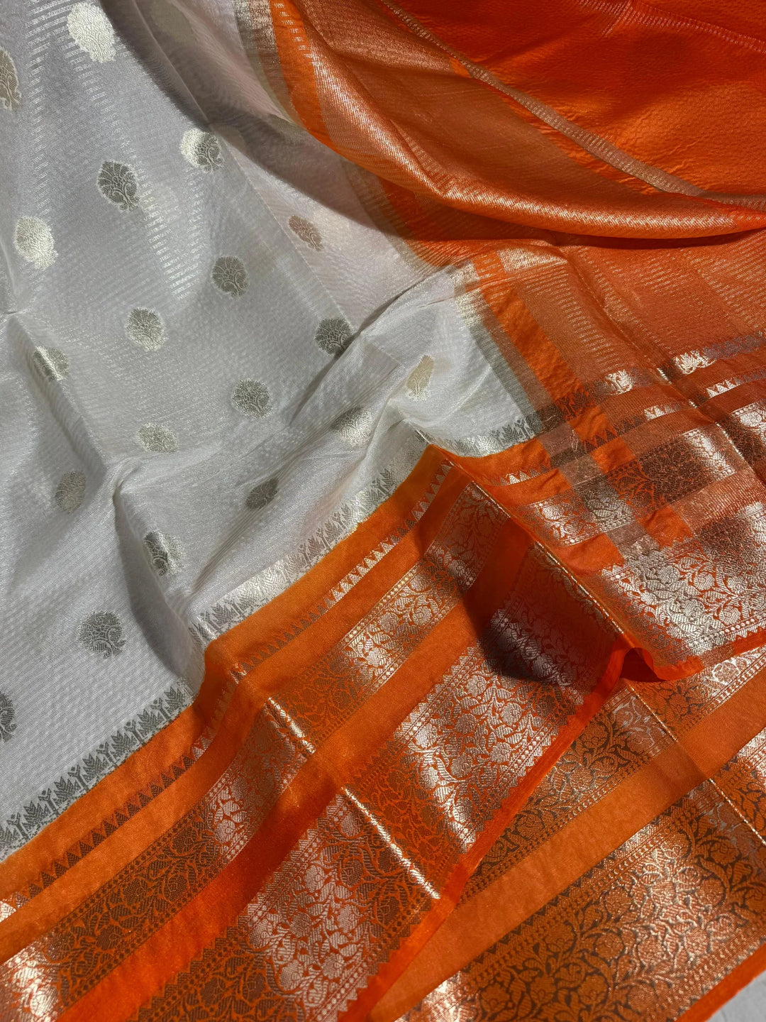 summer friendly cream with contrast rich border and pallu