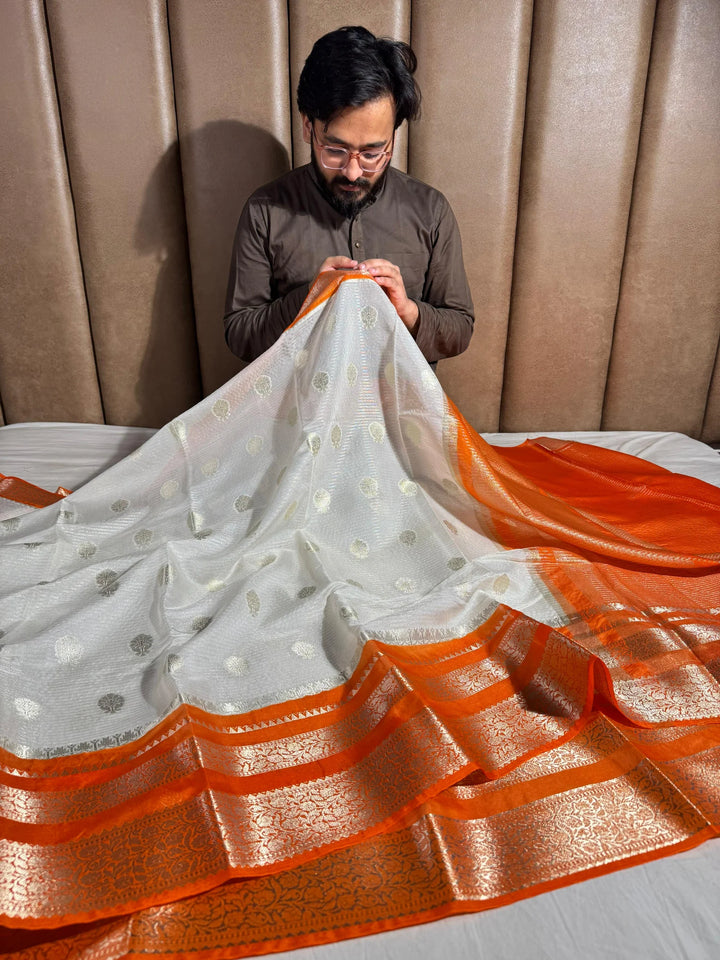 summer friendly cream with contrast rich border and pallu