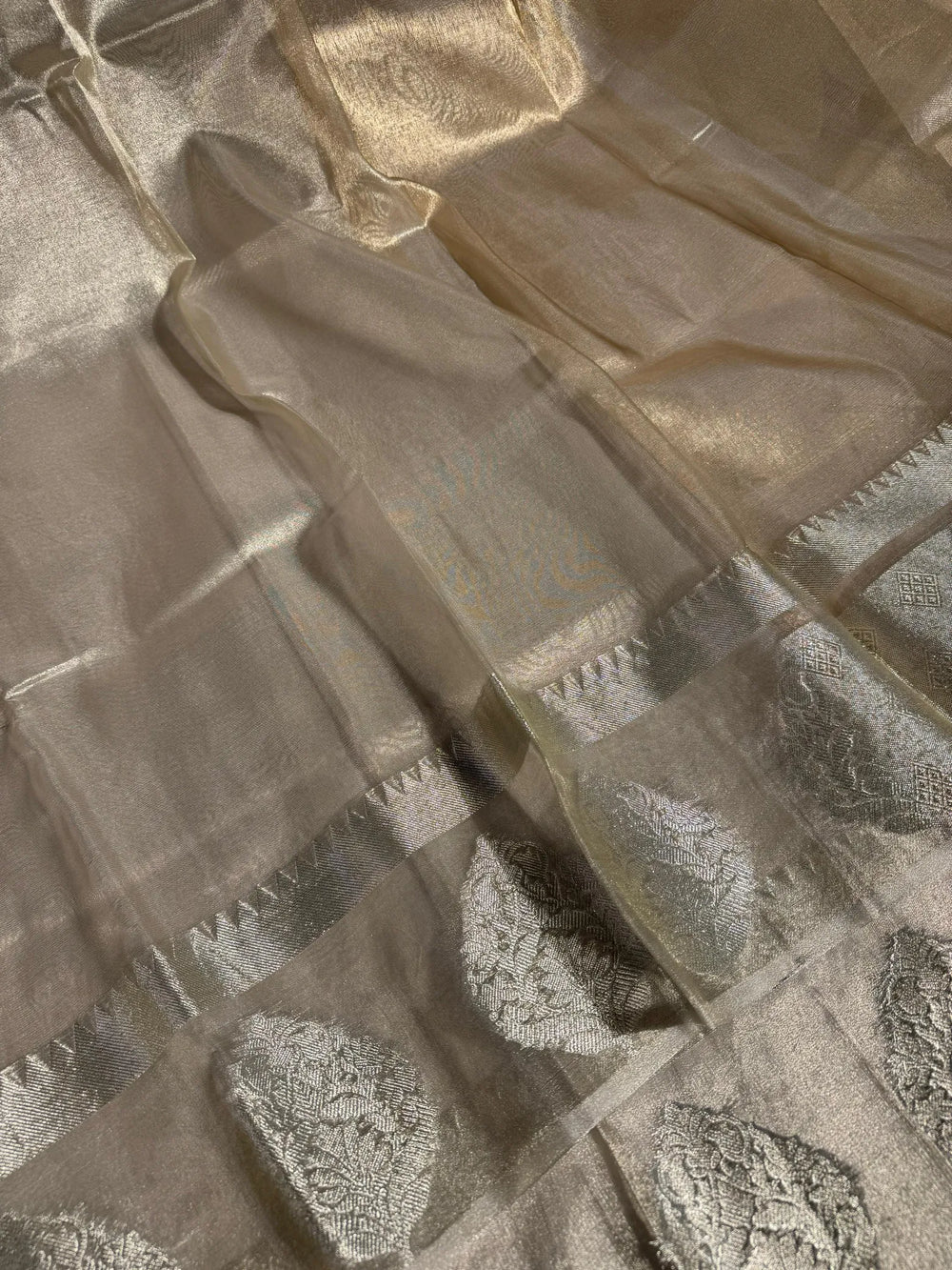 water tone tissue silk saree with rich zari pallu and exclusive border