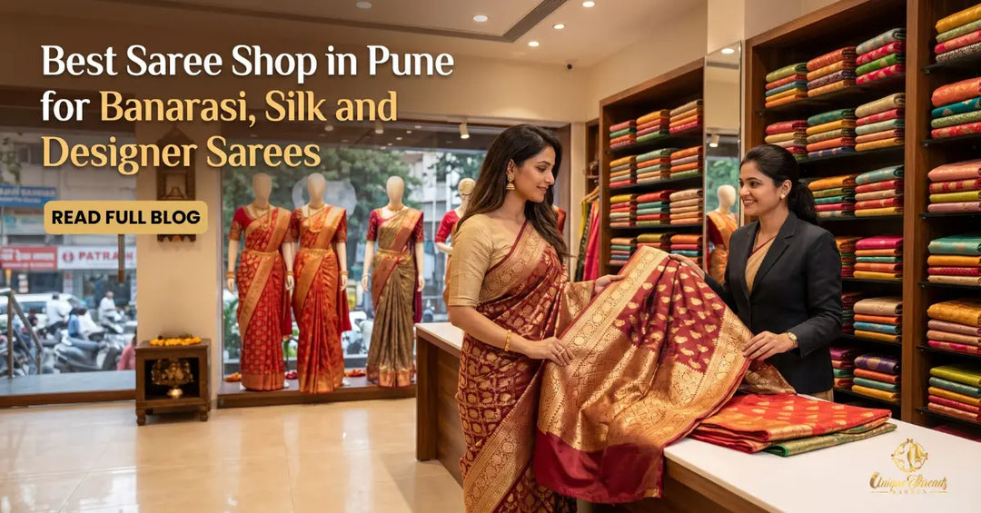 Customer shopping for a Banarasi silk saree at the best saree shop in Pune, featuring designer, silk, and wedding saree collections in a modern showroom.