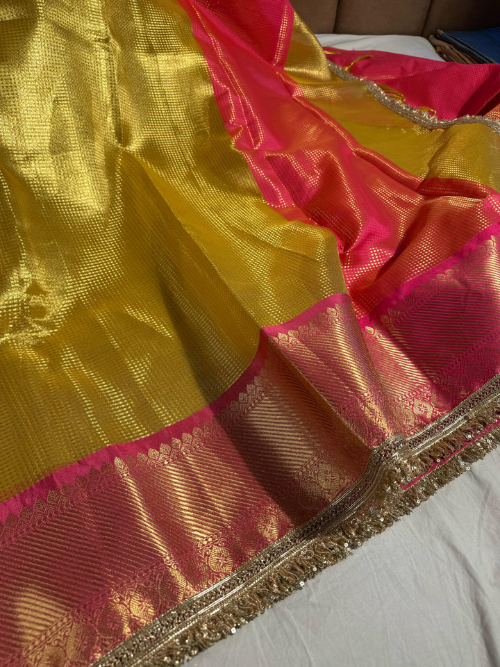 Yellow Shade Banarasi tissue silk saree with lace work