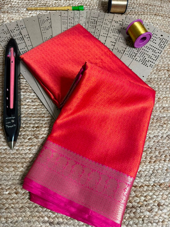 Bright Orange Embossed Tanchui Banarasi Saree