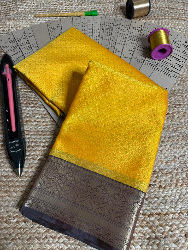 Lemon Yellow Embossed Tanchui Banarasi Saree