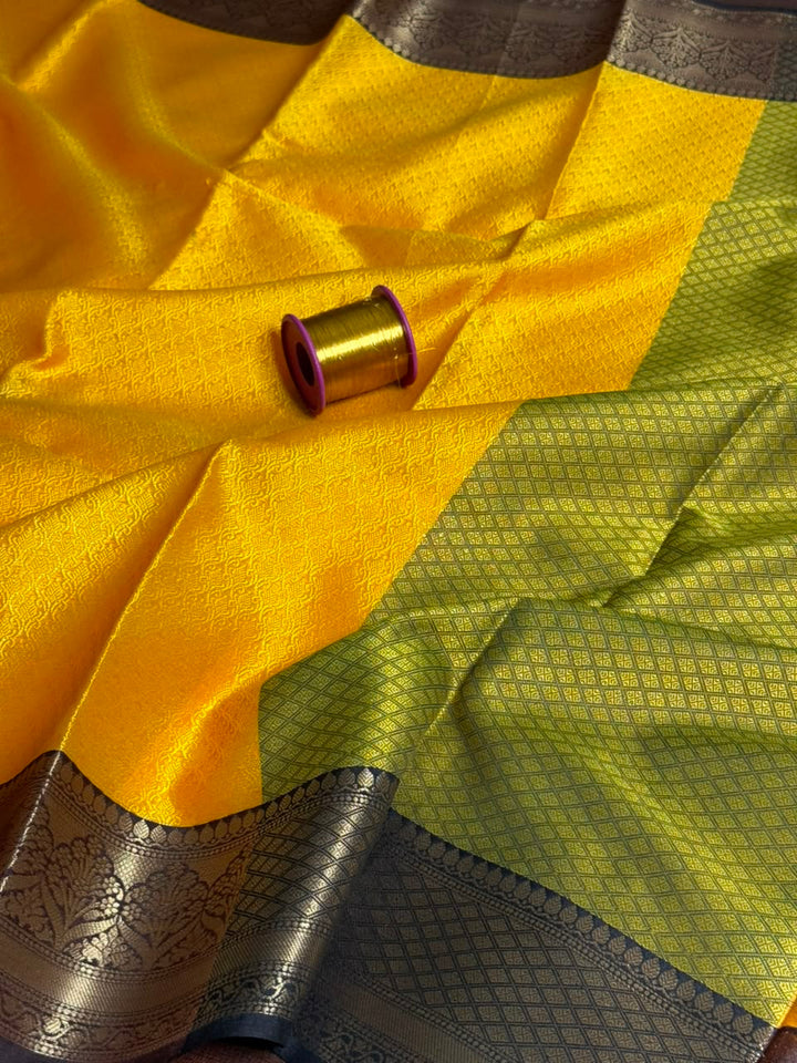 Lemon Yellow Embossed Tanchui Banarasi Saree