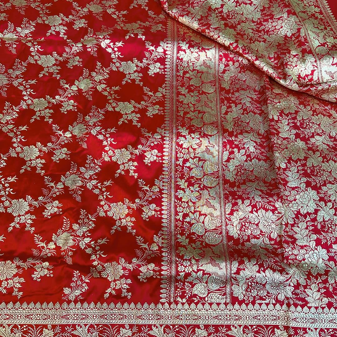 An Exclusive Red the Trademark Banarasi Pure Katan Silk Saree