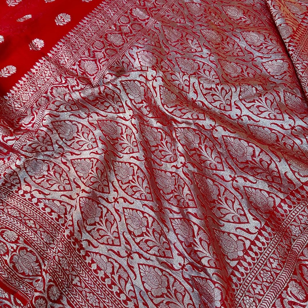 An Exclusive Bright Red Pure Khaddi Georgette Silk Saree