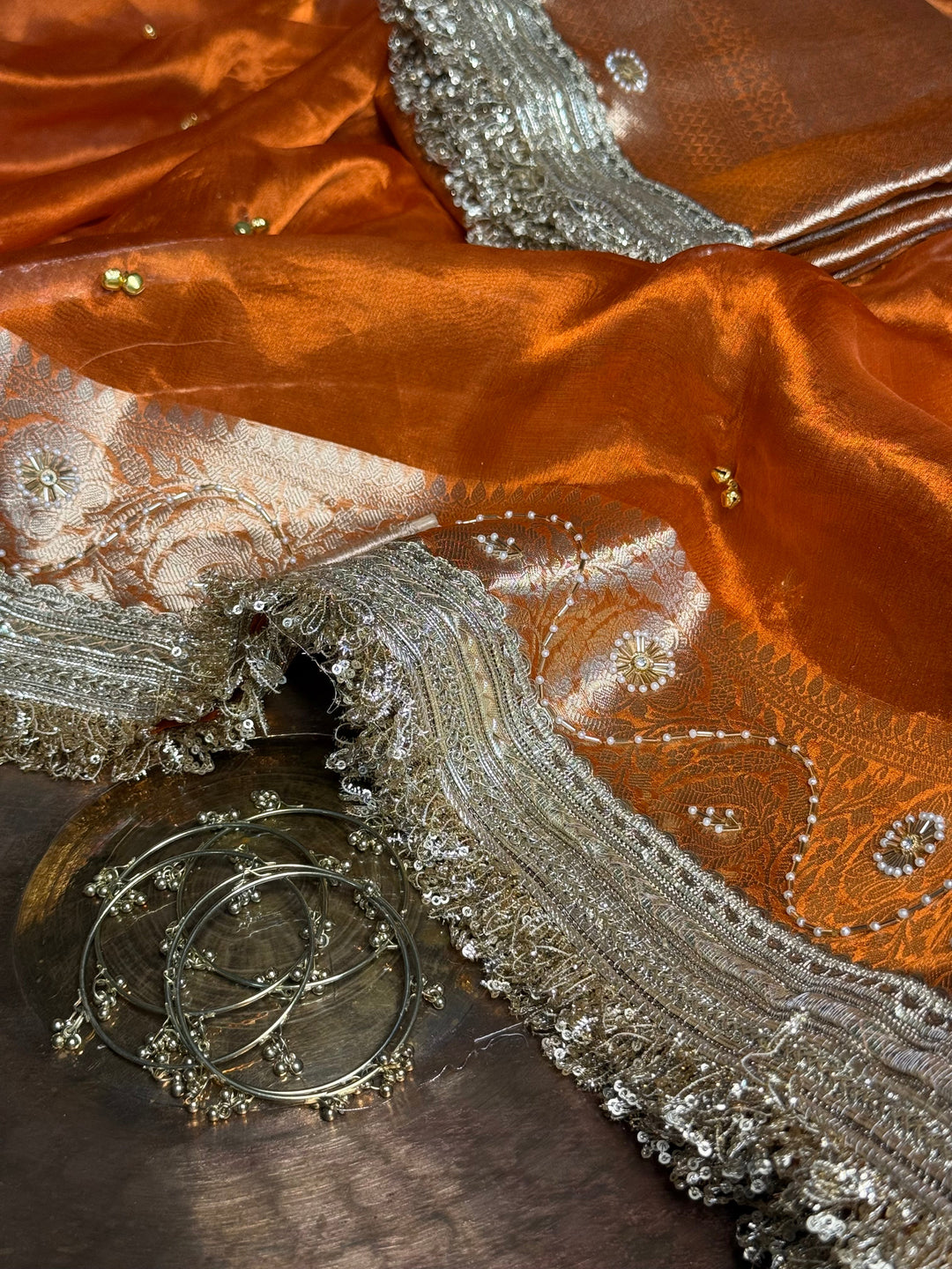 Metallic Orange Pure Tissue Silk Ghungroo Handwork Saree