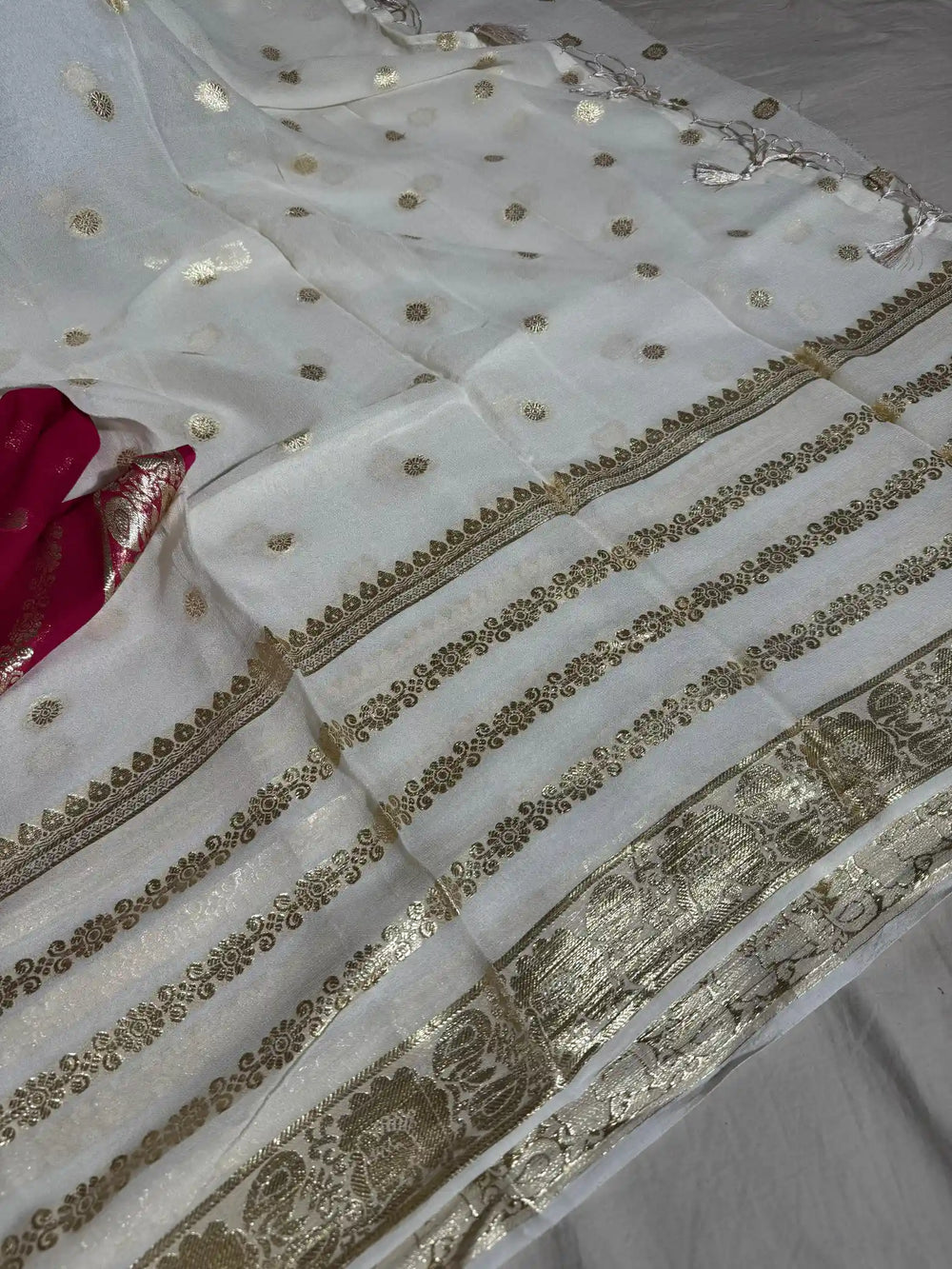 Banarasi georgette silk saree with contarst rich blouse and tassel pallu