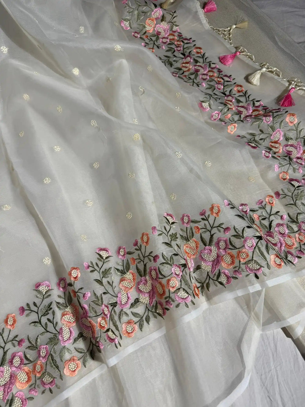 Banarasi organza silk with NoorTaar technique border and pallu work with premium tassels