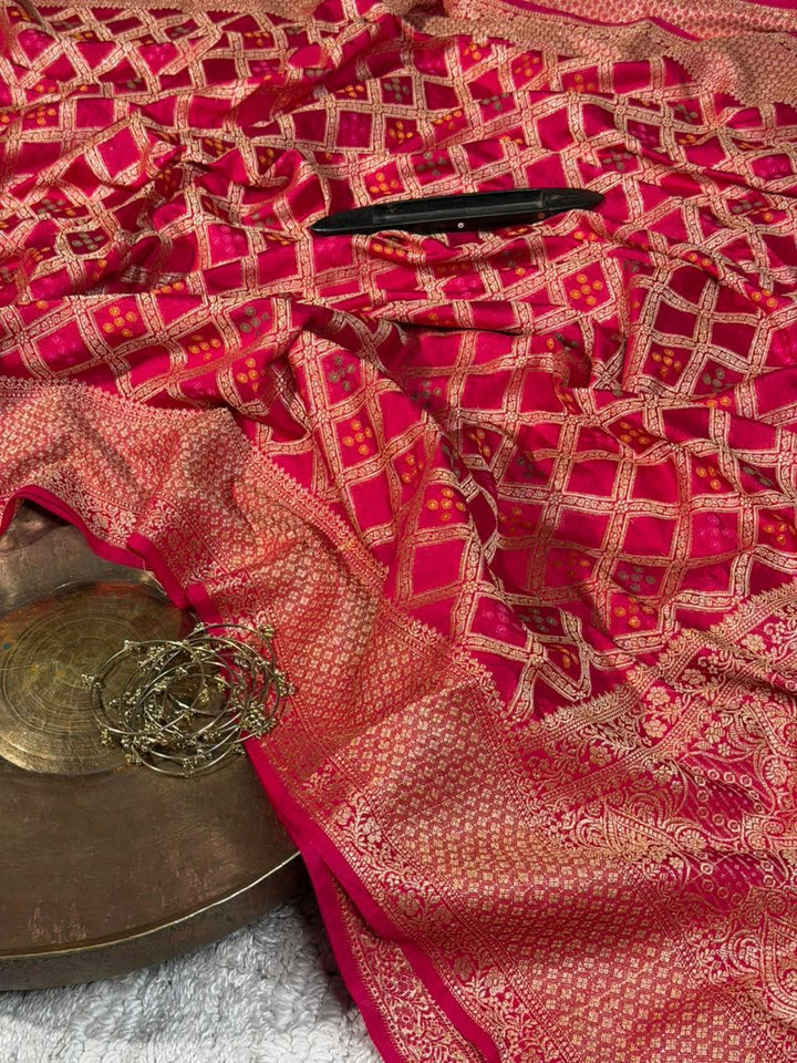 Bandhani Weave Warm Silk Banarasi Saree In Rani Shade