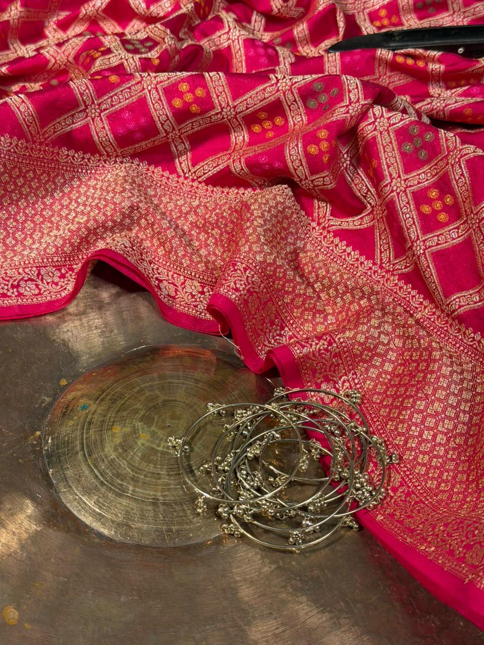 Bandhani Weave Warm Silk Banarasi Saree In Rani Shade