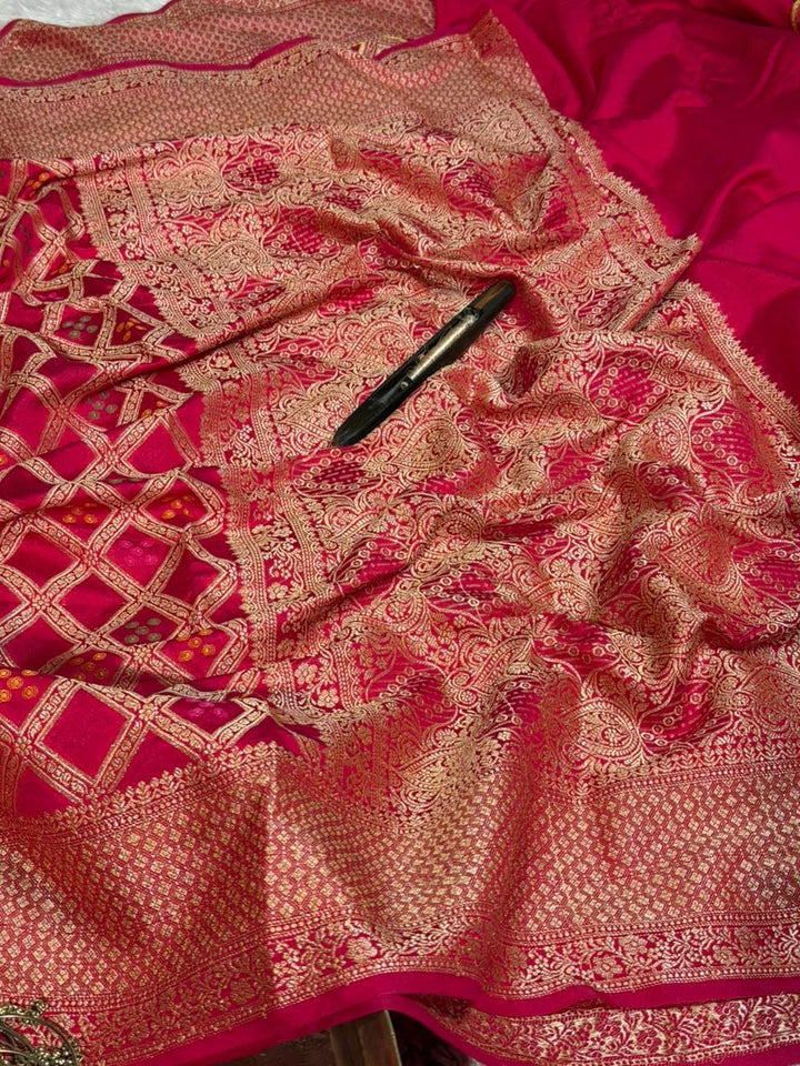 Bandhani Weave Warm Silk Banarasi Saree In Rani Shade