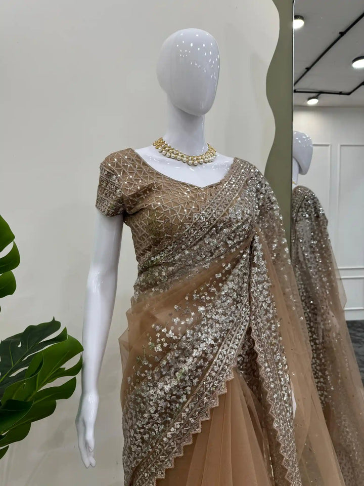 Dreamy Saree Premium net fabric with sequence work saree with exclusive border