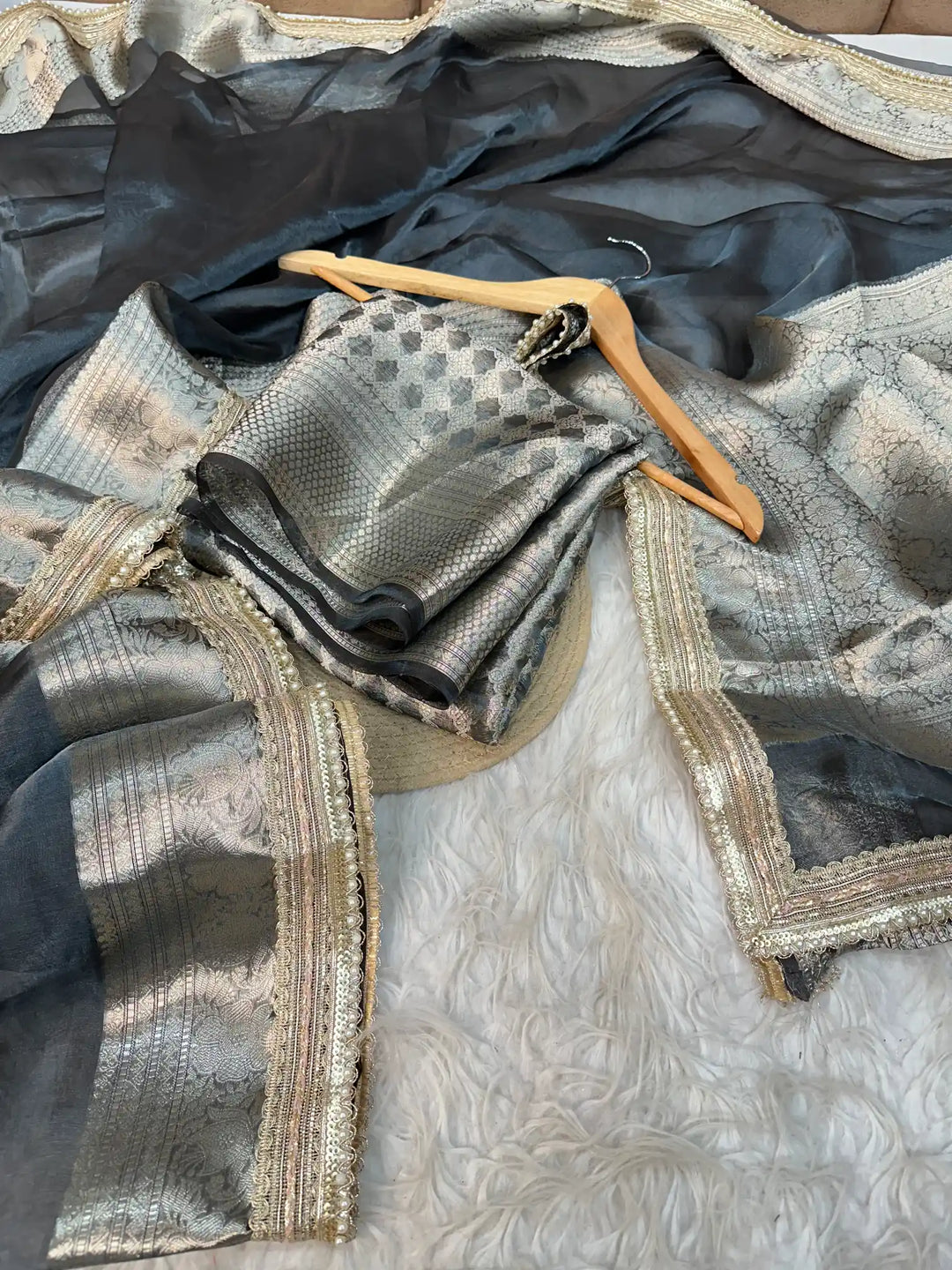 Black Pure Banarasi tissue silk saree with exclusive lacework and rich pallu