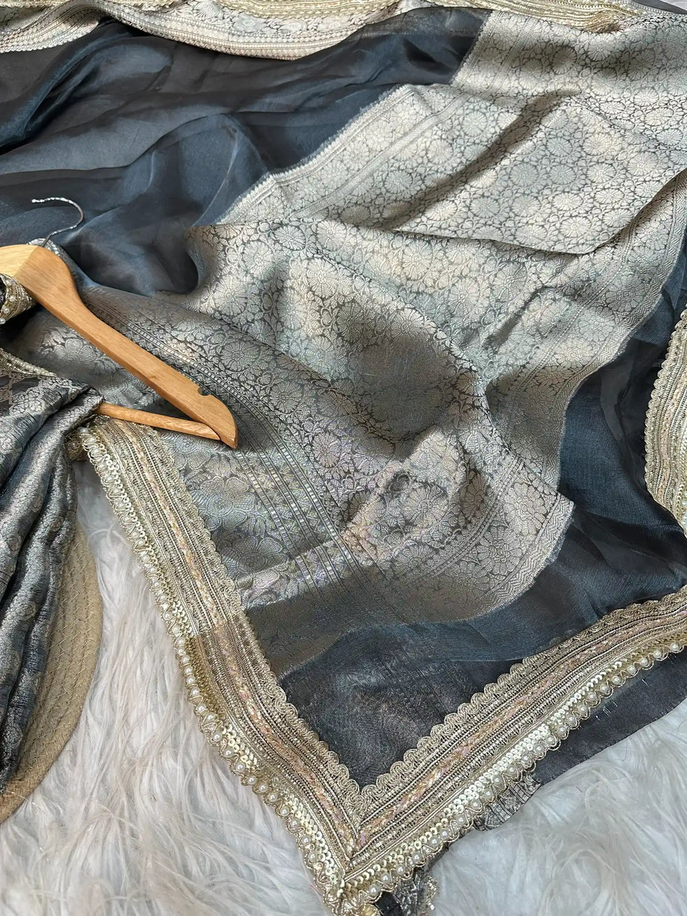 Black Pure Banarasi tissue silk saree with exclusive lacework and rich pallu