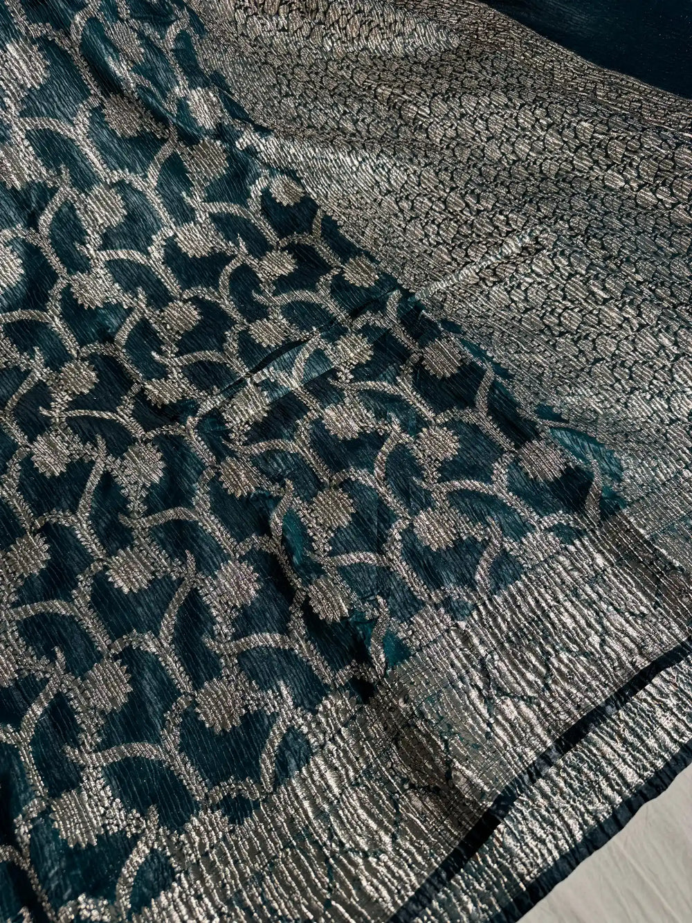 Midnight Green Pashmina silk saree with vertical crush pattern and rich pallu
