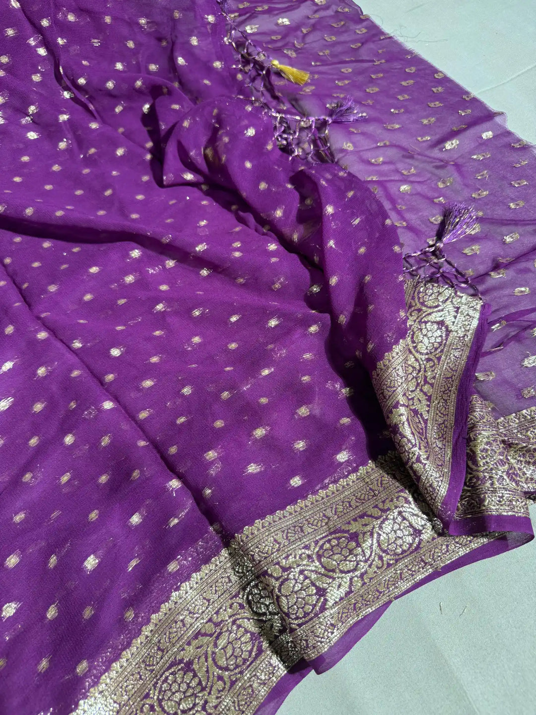 Bright Purple Premium Viscose Georgette Banarasi Saree with Handmade Tassles