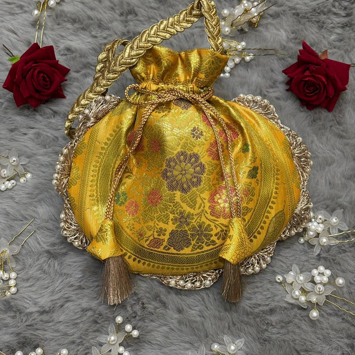 Bright Yellow Eccentric Lace Work Banarasi Potli Bags