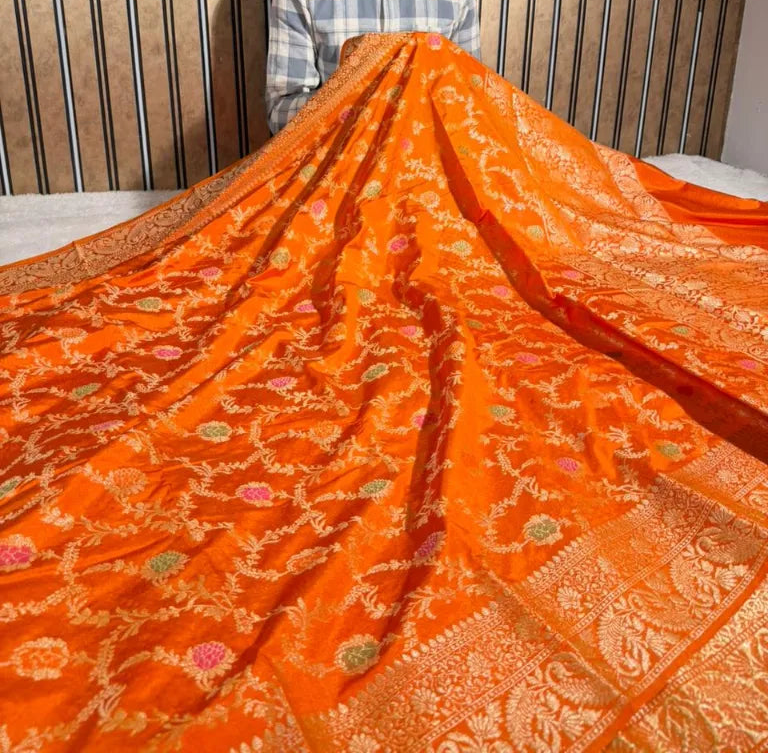 Bright orange floral Meenakari warm silk Banarasi saree