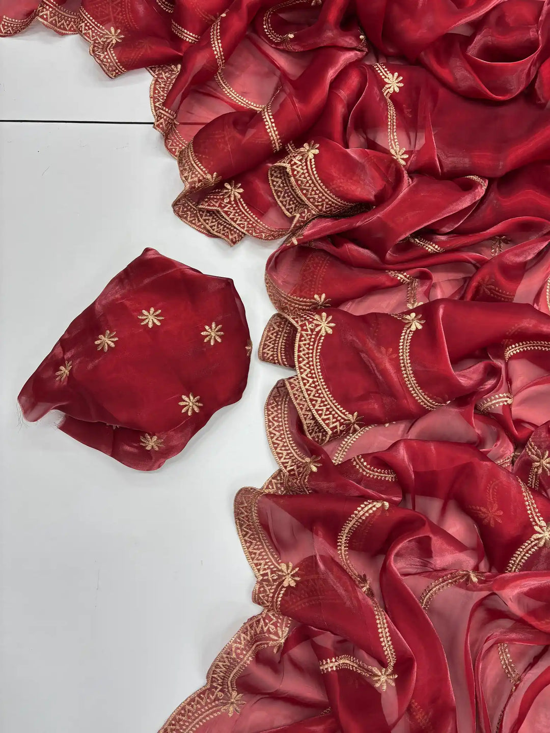 Deep Carmine Shimmery Tissue Silk Saree with Lace Work