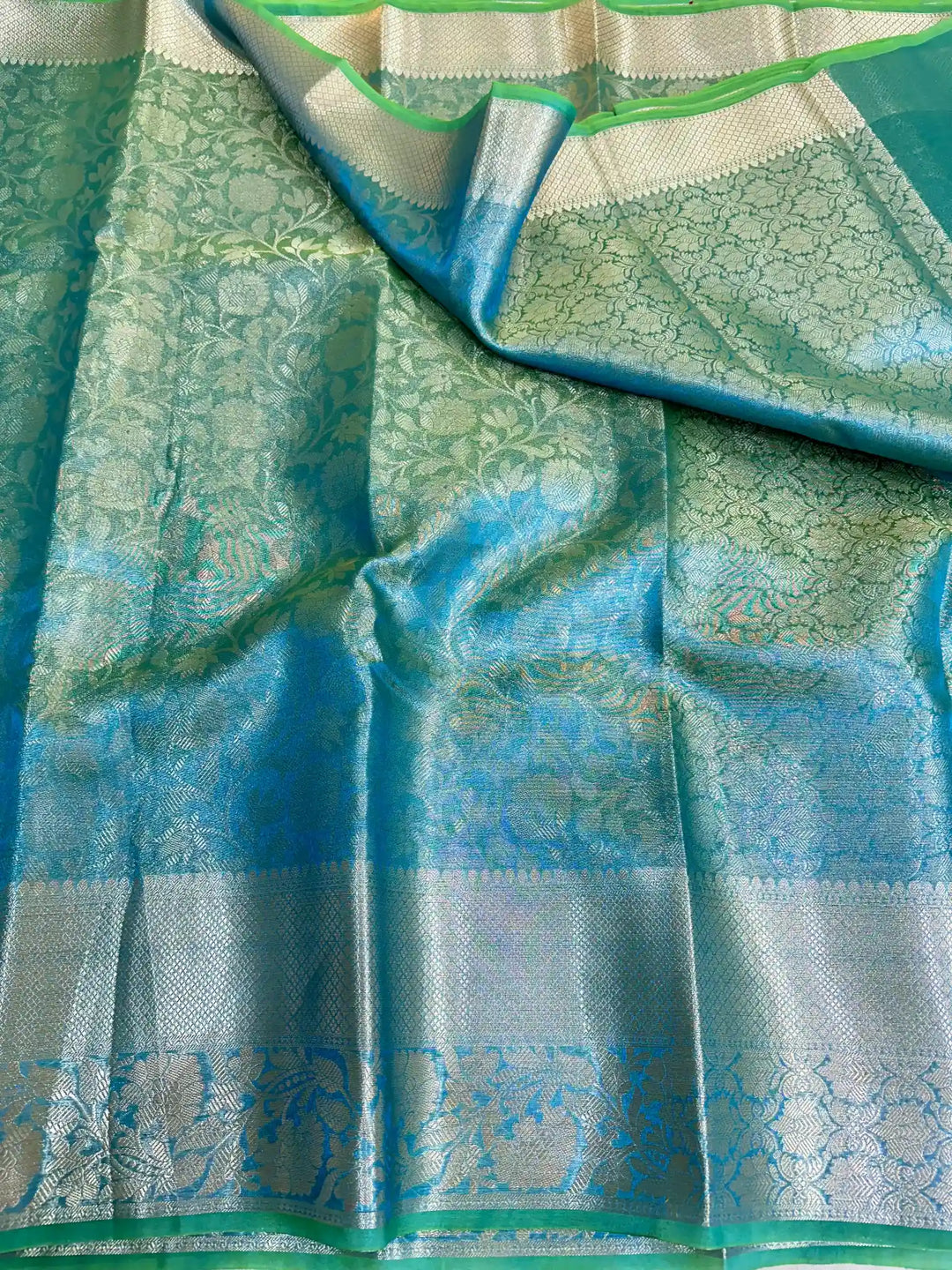 Dual Tone Tissue Silk Embossed Floral Saree