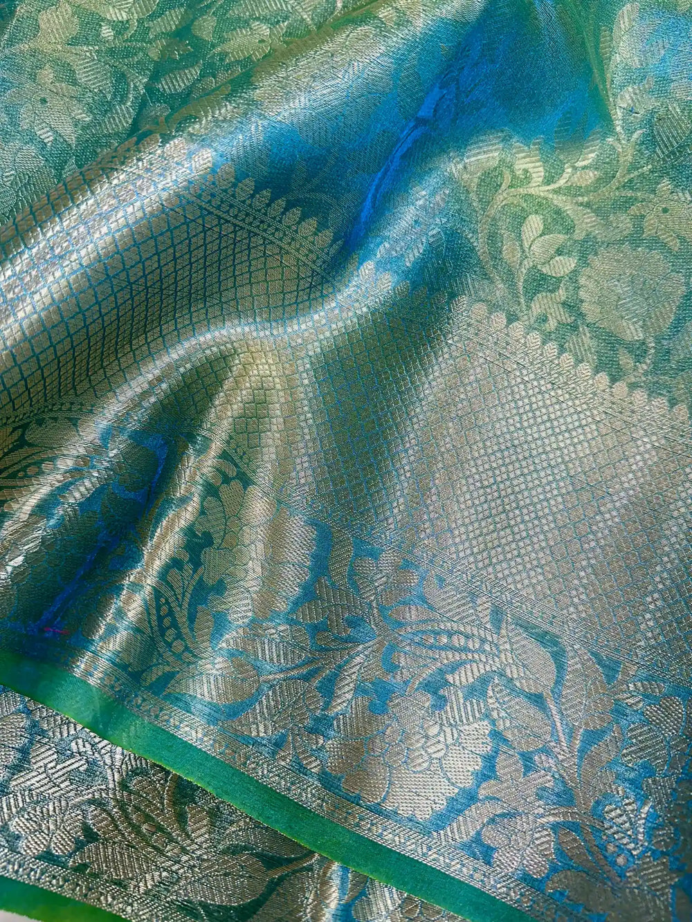 Dual Tone Tissue Silk Embossed Floral Saree