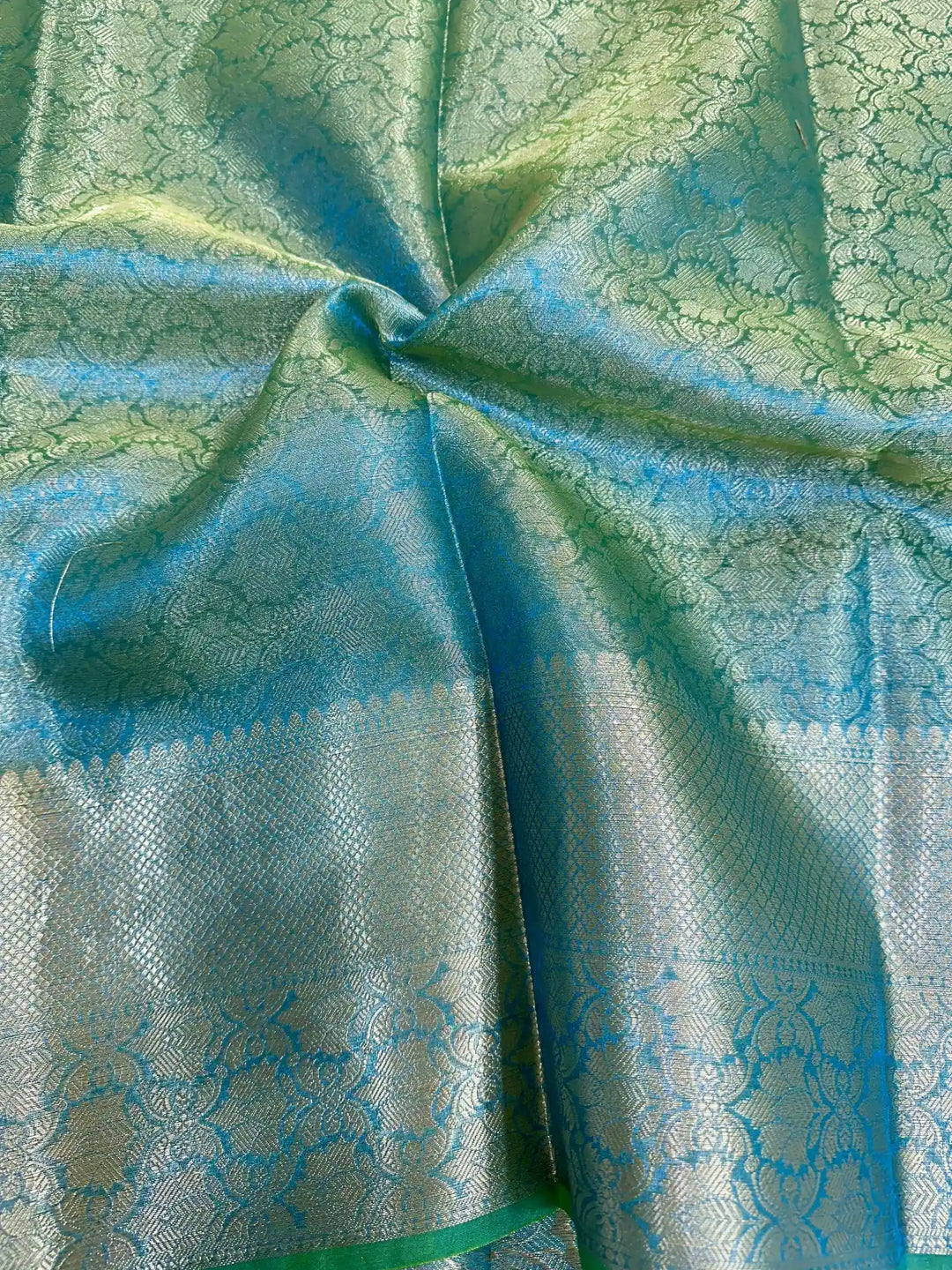 Dual Tone Tissue Silk Embossed Floral Saree