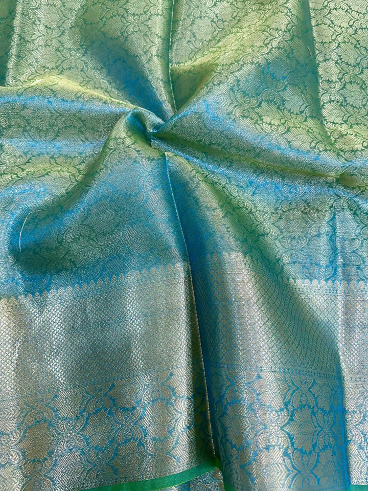 Dual Tone Tissue Silk Embossed Floral Saree