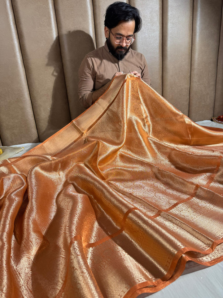 Dust Orange kanjivaram tissue silk daree with rich pallu and blouse