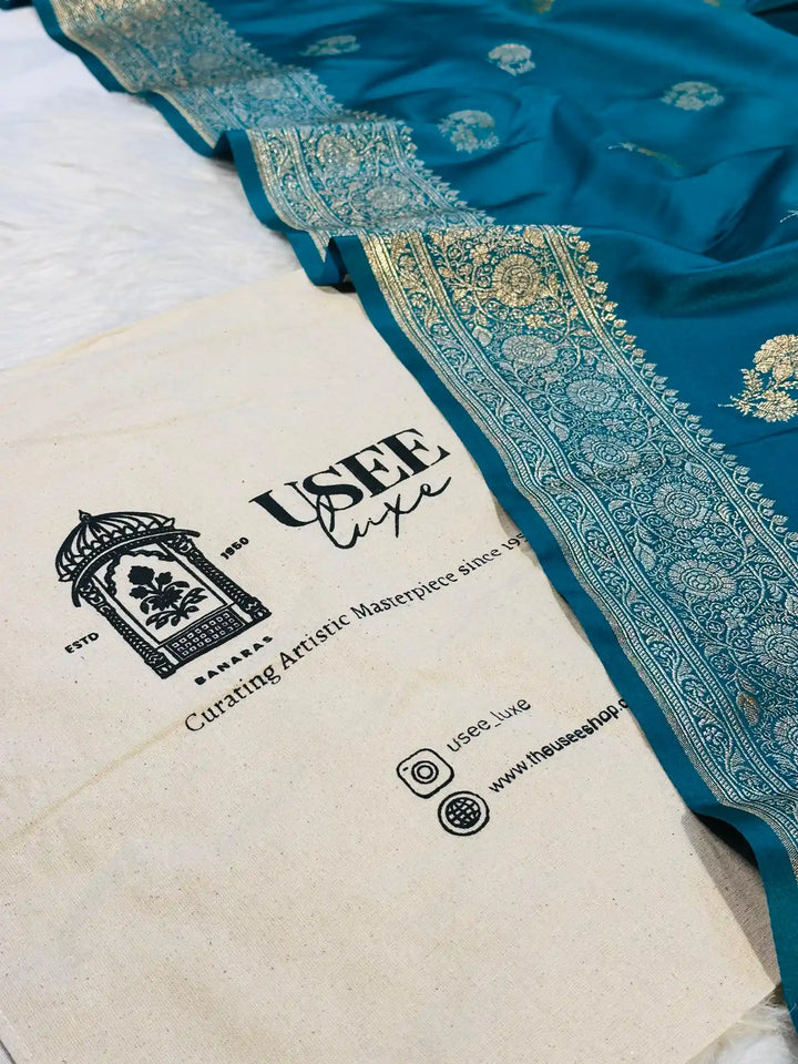 Eccentric Rama Green Satin Katan Silk Saree